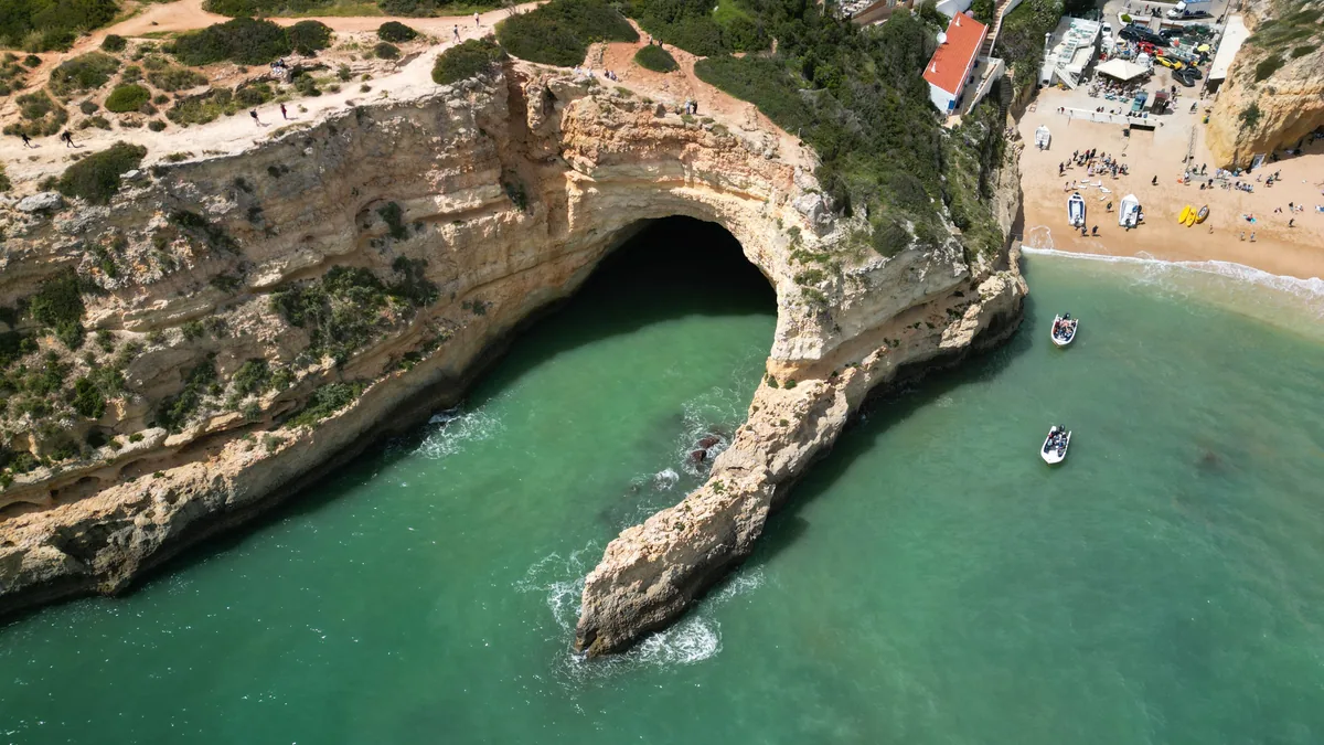 Algarve cliffs near Benagil, where best eSIM Portugal coverage can thin out along the coastal paths